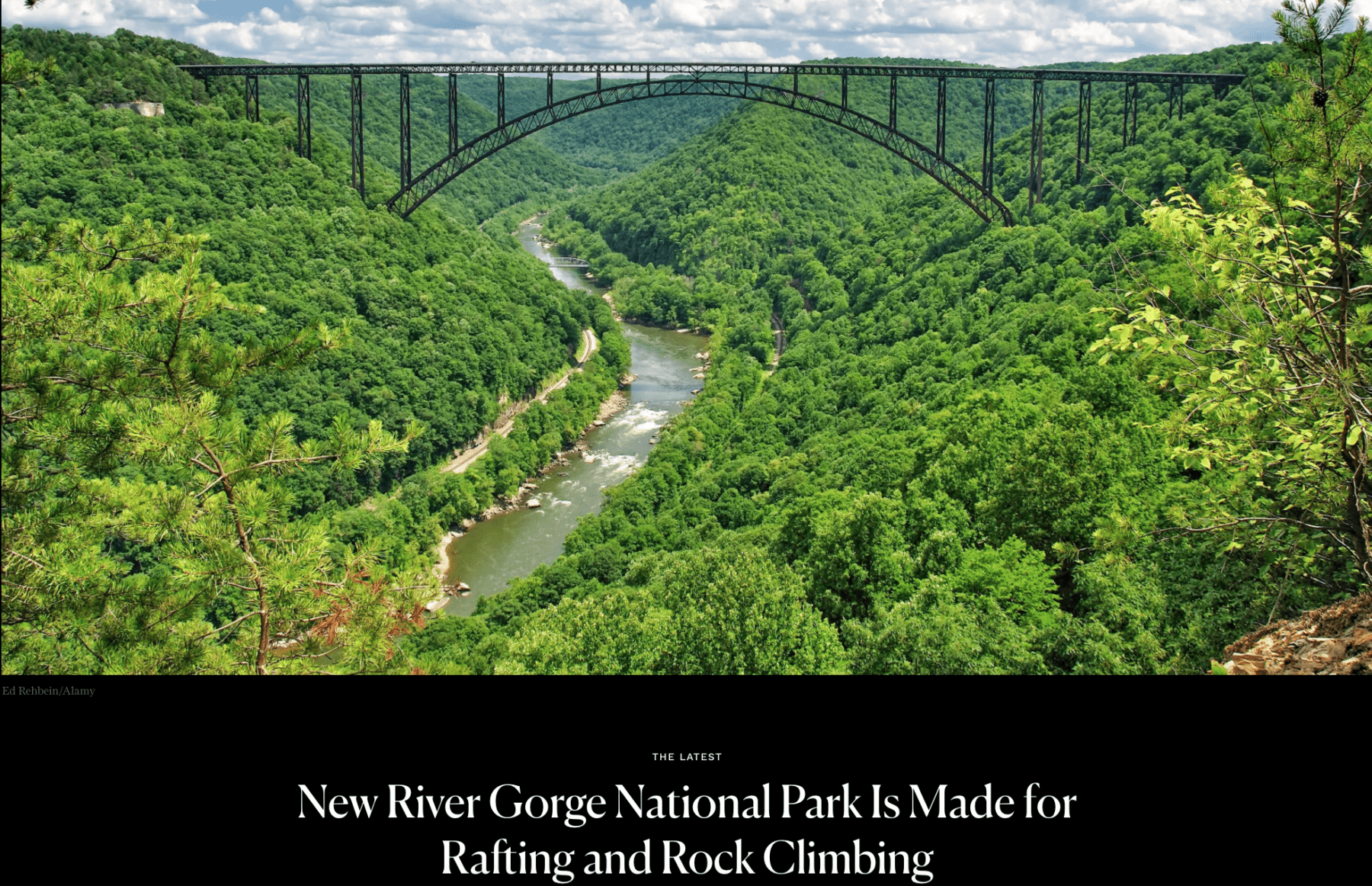 Screenshot of an article titled New River Gorge National Park is Made for Rafting and Rock Climbing with an image of lush greenery and a large trestle bridge going over the New River Gorge. 
